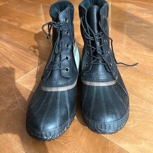Sorel waterproof rain/snow boots. Black w/ brown details. Size mens 10 brand new